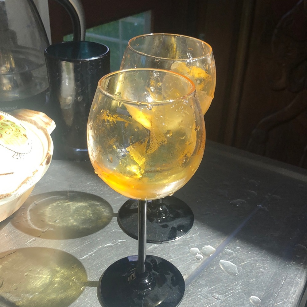 Hand blown wine with gold leaf and black stem